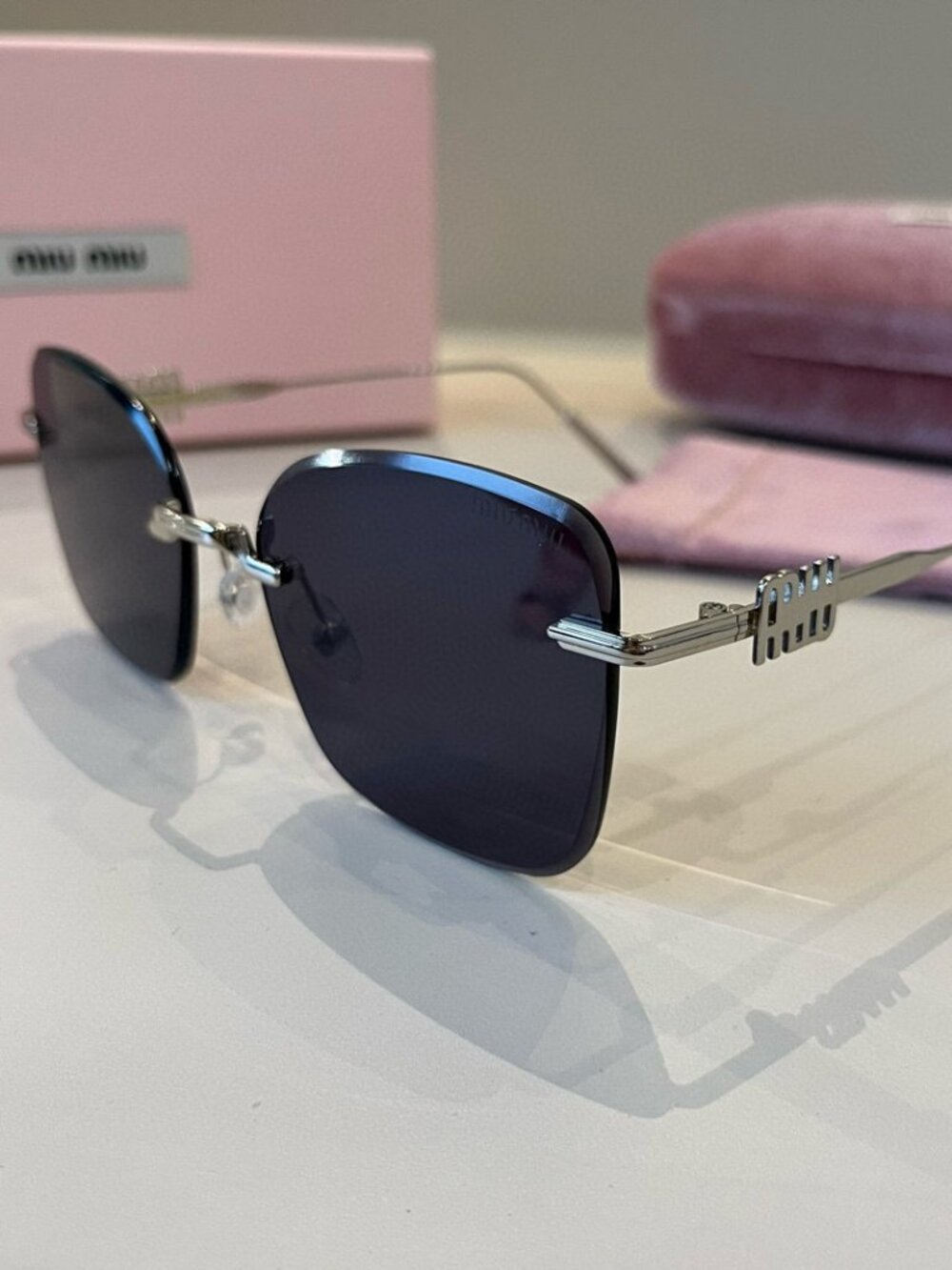 Miu Miu Frameless Sunglasses with UV Protection